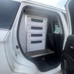 Mitsubishi Outlander 2.4h TwinMotor PHEV Reflex Plus CVT 4WD Commercial Van with fitted internal storage drawers and large boot space. - Thumbnail 1