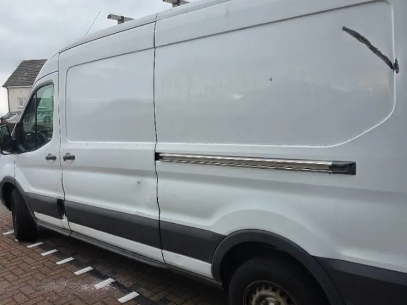 White panel van 64 plate side loading door